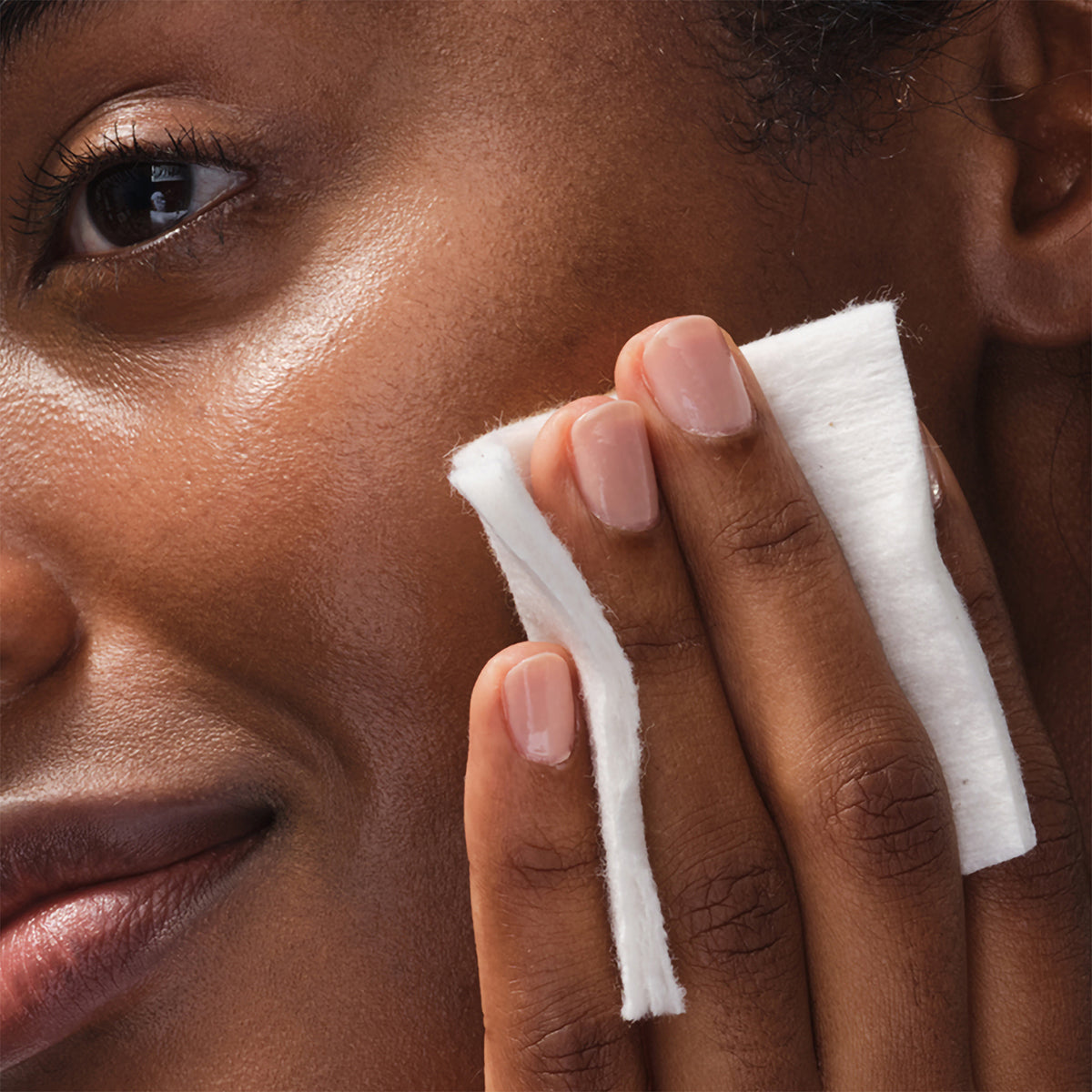 Model using the organic cotton pads.